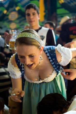 dirndlatoktoberfest A woman in a sexy Dirndl at at a beer festival
